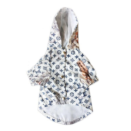 White dog rain jacket with blue Louis Vuitton style monogram print and jungle animal graphics front view