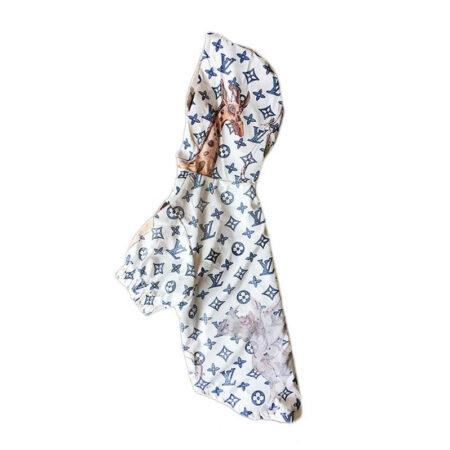 White waterproof dog jacket LV inspired with jungle graphics side view on white background