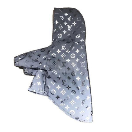 Silver reflective dog windbreaker Louis Vuitton inspired with V monogram pattern flat lay
