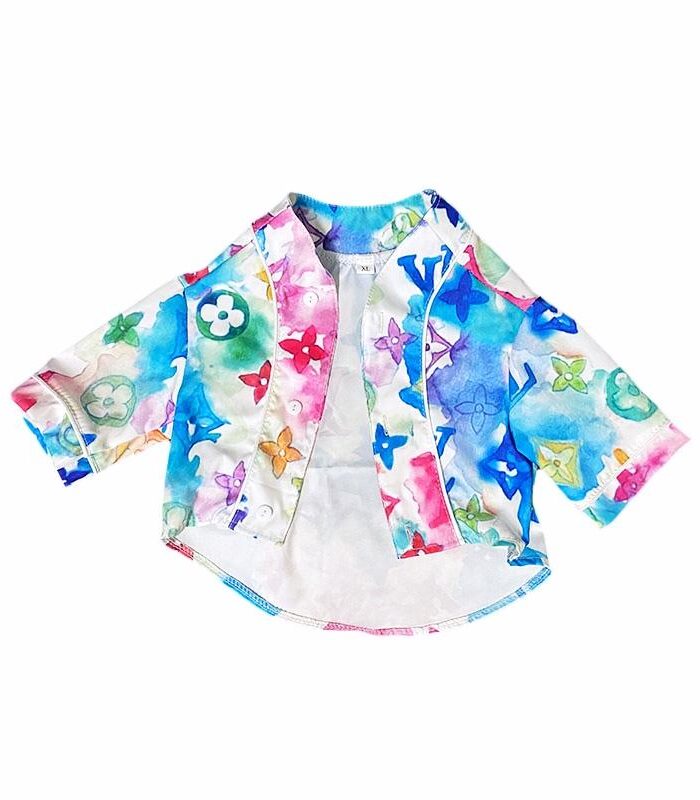 Watercolor monogram dog shirt with blue pink green LV pattern on white background