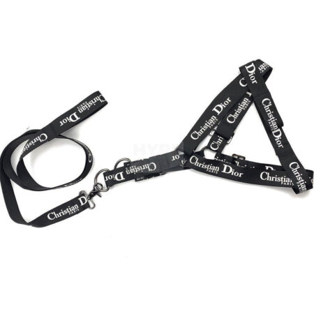 Dog harness and leash set with allover Dogior text branding in black nylon webbing