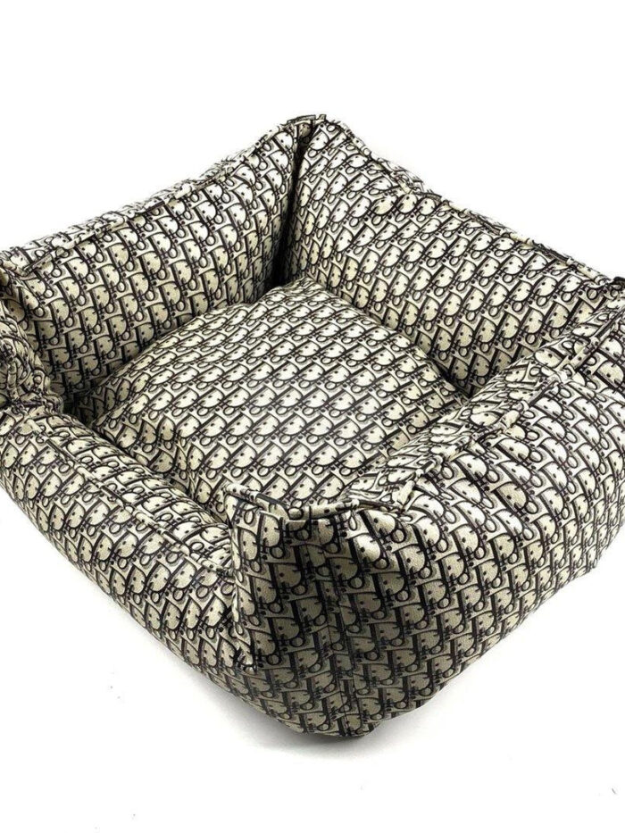 Square luxury dog bed with removable cushion showing Dior inspired oblique monogram print