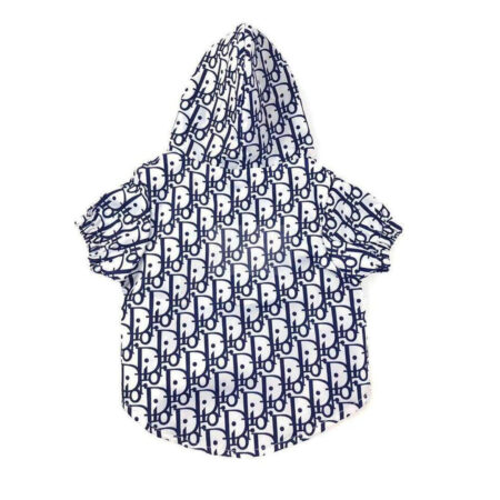 White dog windbreaker with navy Dior monogram print laid flat on white background