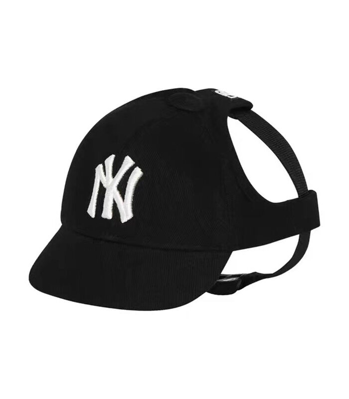 Black dog baseball cap with white embroidered NY Yankees logo and adjustable chin strap