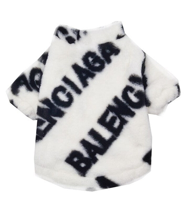 White faux fur dog jacket Balenciaga inspired with black logo print on flat surface