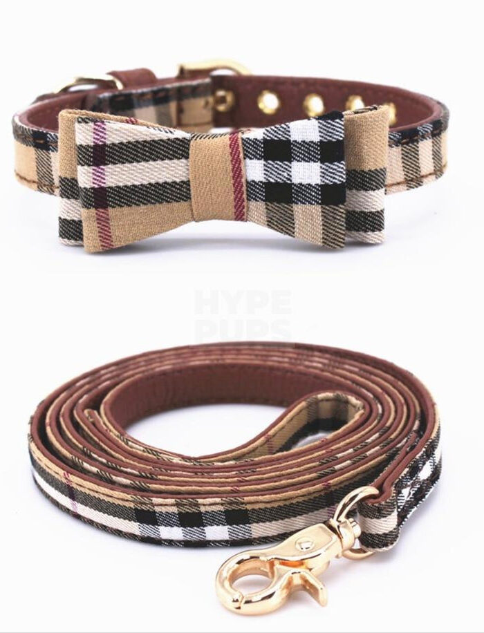 Tan plaid dog collar with bow detail and matching leash inspired by Burberry on white background