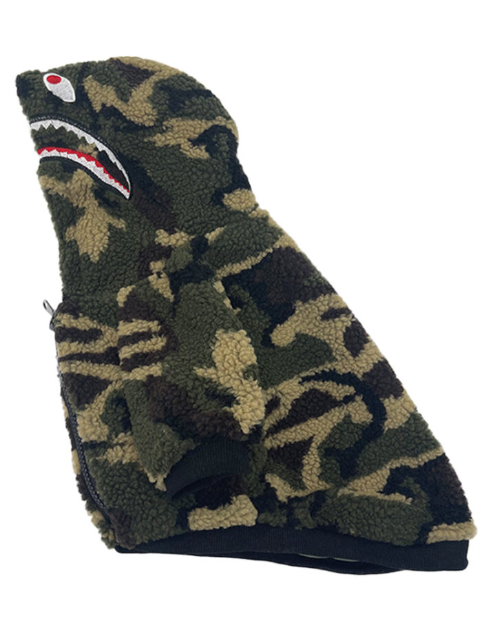 Side view of camo dog hoodie showing shark mouth detail and red eyes on hood