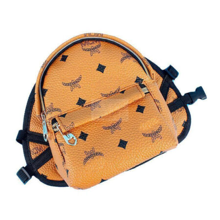 MCM diamond pattern dog carrier showing structured design and zip closure
