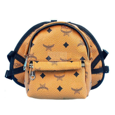 Cognac brown MCM monogram dog carrier with black diamond print and padded straps