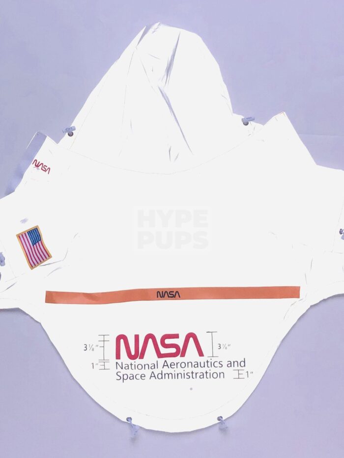 White NASA dog windbreaker with hood and American flag patch on sleeve