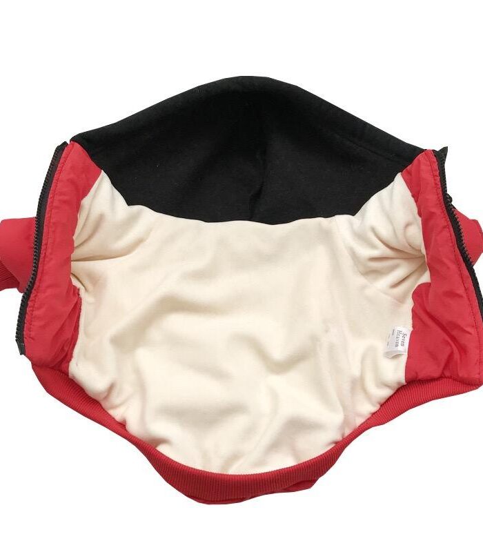 Interior view of red Yankees dog jacket showing cream lining and ribbed trim