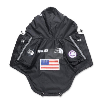 Black technical dog windbreaker Supreme North Face collaboration style with multiple brand patches